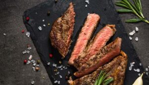 Blackstone Grille restaurant tavern and bar in Chattanooga, Tennessee serves the best steaks and chops grilled and garnished with rosemary and garlic