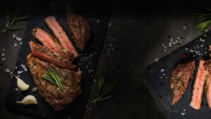 Blackstone Grille restaurant tavern and bar in Chattanooga, Tennessee serves the best steaks and chops grilled and garnished with rosemary and garlic